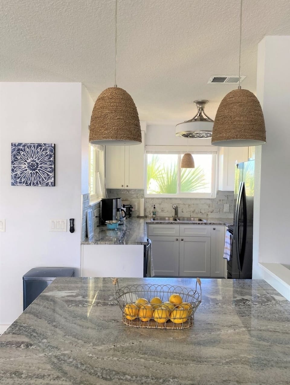 Each side features fully stocked kitchen for at home cooking
