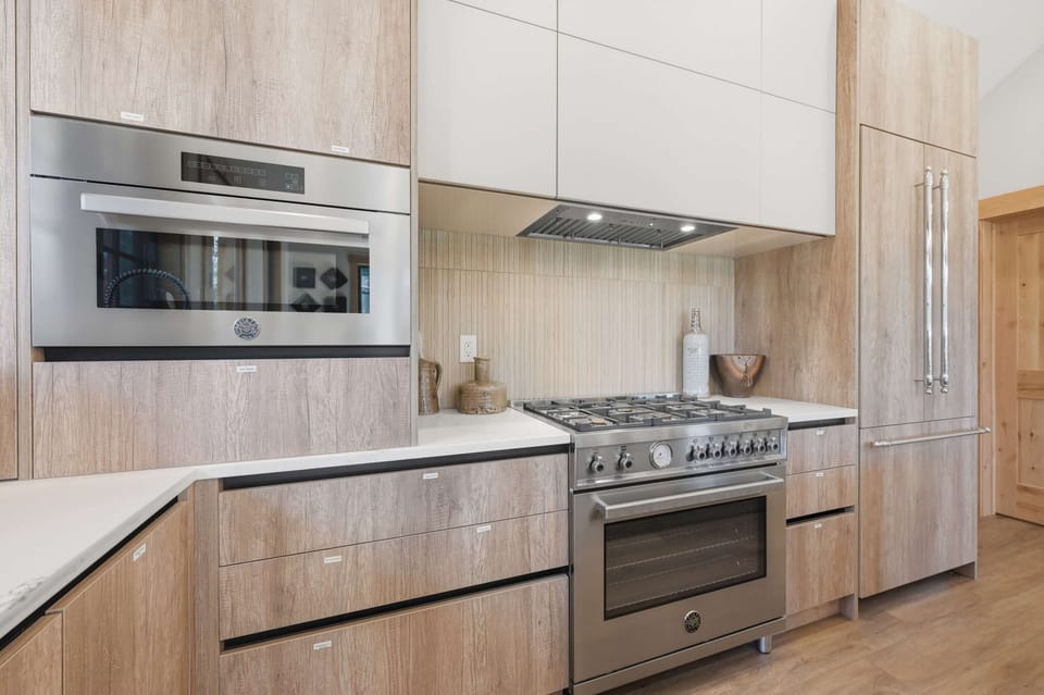 Kitchen is equipped with large pantry room, spices, etc