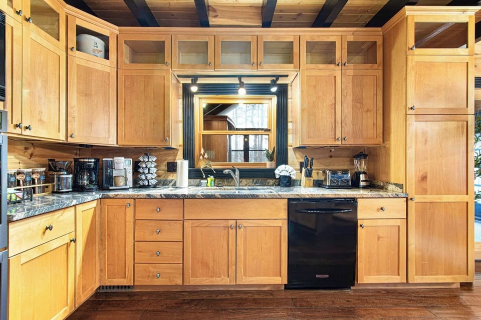 Wake up to a well-equipped kitchen with all your coffee needs and more — ideal for cooking with a view and making memories over shared meals.