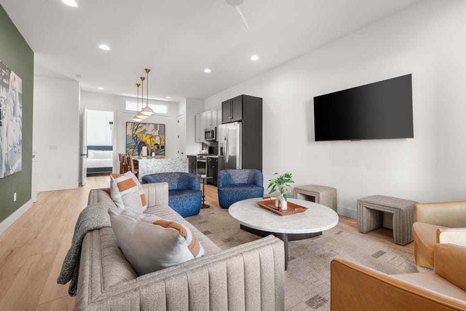 Spacious and comfy living room located on the 2nd floor along with the primary bedroom and bathroom, and the luxury open kitchen. 