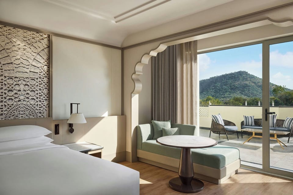 Premier Room, 1 King Bed, Balcony | In-room safe, blackout drapes, soundproofing, iron/ironing board