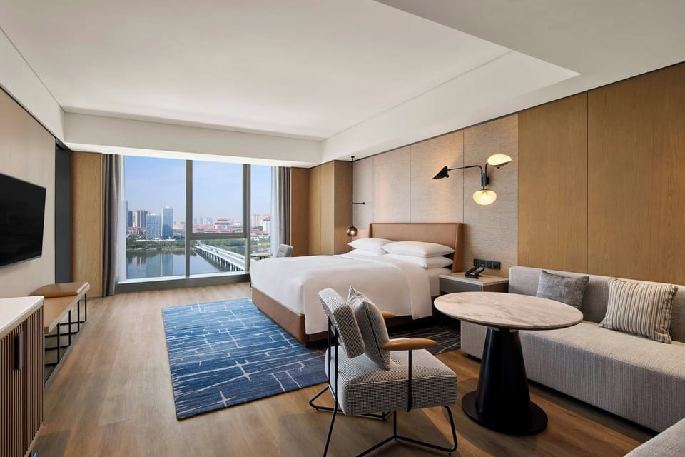 Exclusive Studio, 1 King Bed, Bay View | Down comforters, in-room safe, desk, laptop workspace