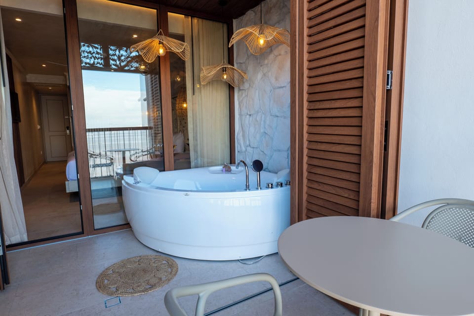 Eco-friendly toiletries, hair dryer, slippers, bidet