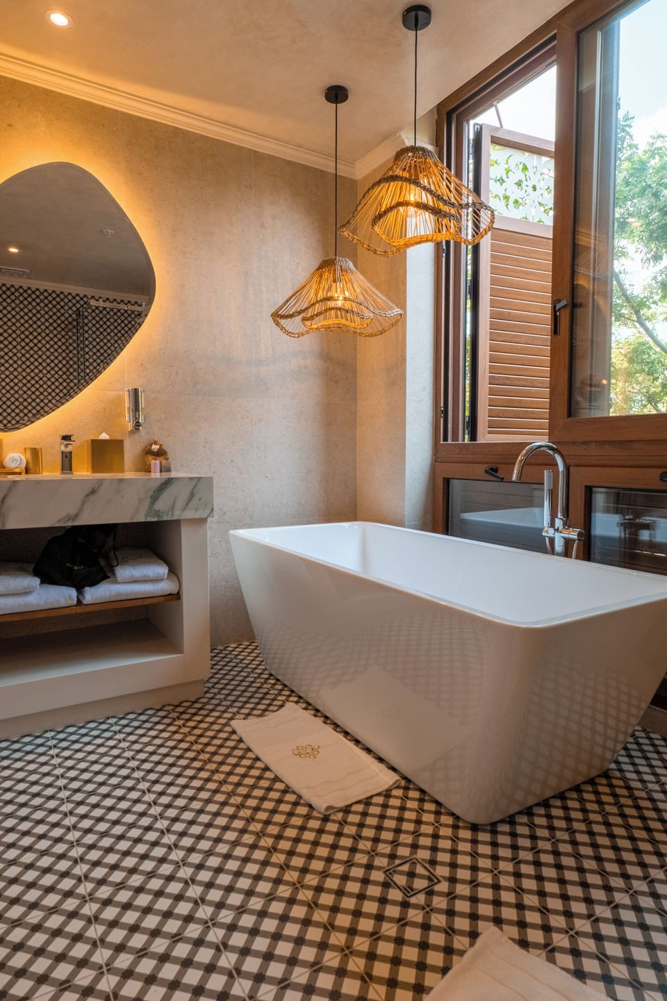 Eco-friendly toiletries, hair dryer, slippers, bidet
