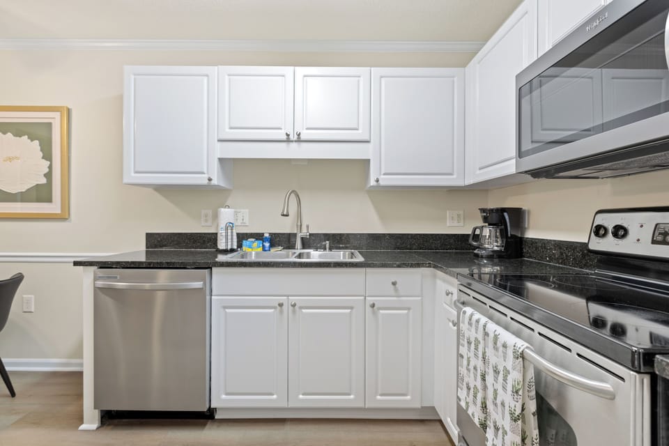 Sleek, stylish, and modern kitchen equipped for your culinary adventures