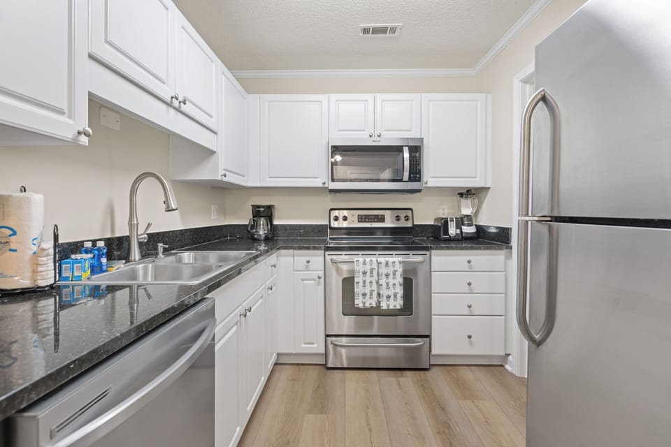 Sleek, stylish, and modern kitchen equipped for your culinary adventures