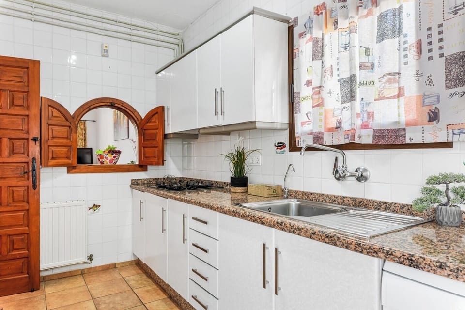 Beautiful holiday villa with private pool situated in Calpe (Costa Blanca) for 6 people, with three bedrooms and two bathrooms distributed on one floor.INTERIOR: The villa is distributed on one floor which is accessed by external stairs. The villa has a pleasant living-dining room with TNT-satellite TV (English) and air conditioning, a separate kitchen with gas cooker, dishwasher and washing machine. This villa for 6 has 3 double bedrooms : 2 bedrooms each with 1 double bed of which 1 with A/C and the third with a bunk bed, 1 bathroom with bathtub and 1 bathroom with shower.OUTSIDE: The villa has a large plot with a nice terrace partly covered, a private fenced rectangular swimming pool of 8x4 m with Roman steps and portable barbecue. Ample private parking for 2 vehicles on the same plot. The plot is completely fenced.LOCATION: This villa is located in a quiet residential area close to amenities and the beach. It is only 400 m from the nearest supermarket and 1,1 km from the sandy beach Playa del Arenal of Calpe with its shops and restaurants. The centre of Calpe is only 1,8 km away.REMARKS: Free WiFi internet access. Pets up to 12 kg are allowed with supplement.