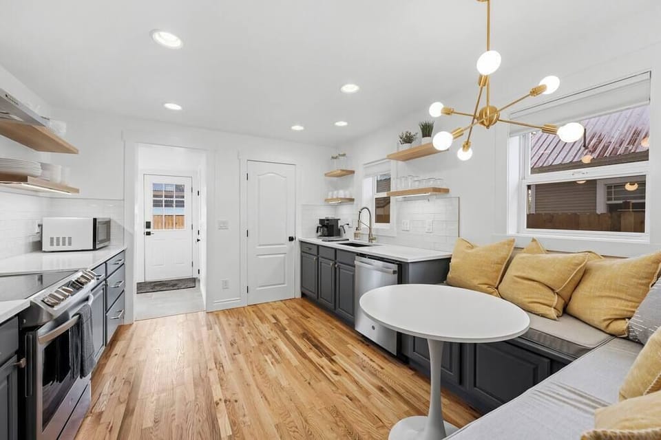 Kitchen that leads to the laundry room, backyard and off street parking.