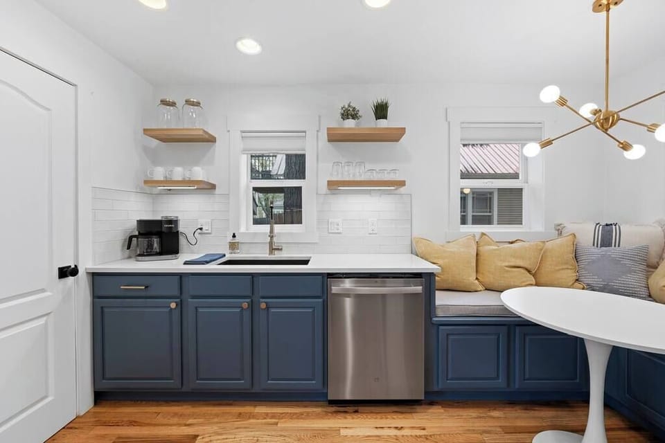 Kitchen with breakfast area and pantry.