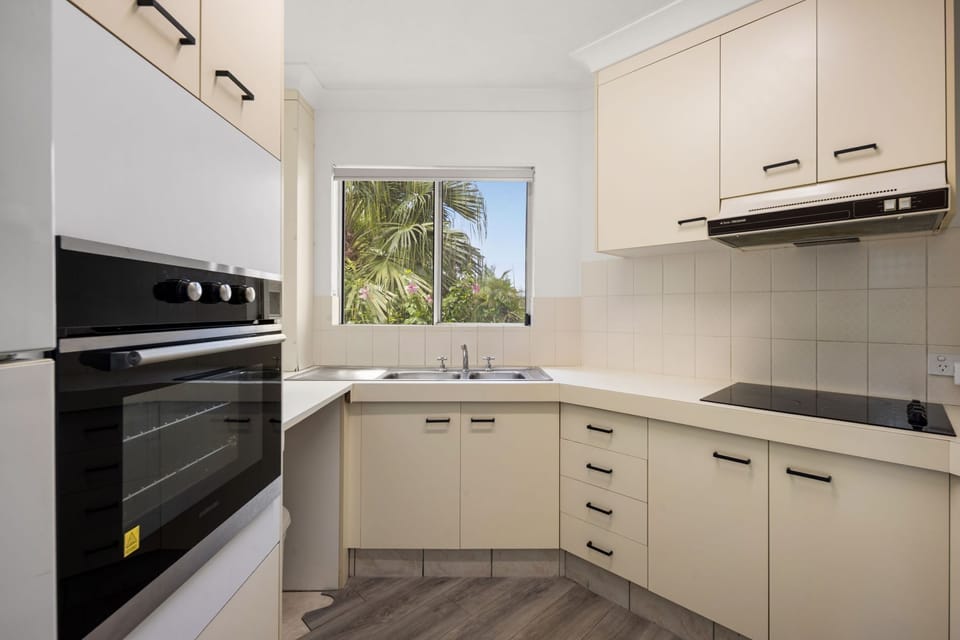 Two Bedroom Apartment in Central Burleigh | Private kitchen | Electric kettle, toaster, cleaning supplies, freezer