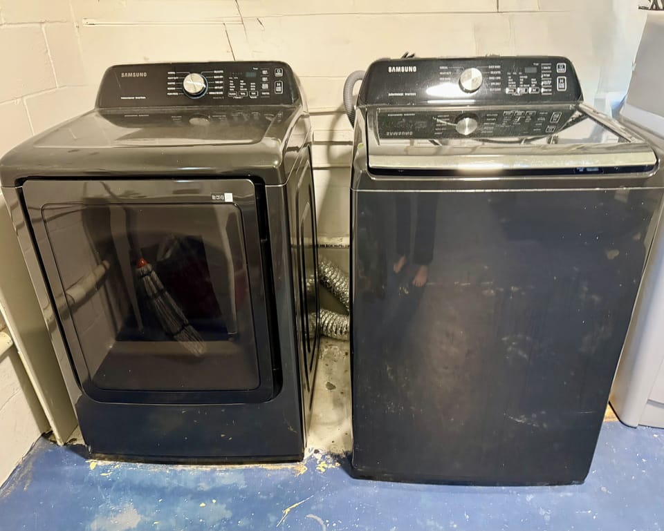 Washer and Dryer in Garage and Game area
