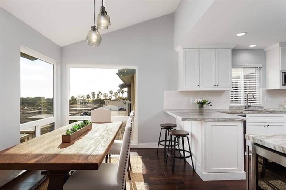 Fully-stocked kitchen with bar stool seating