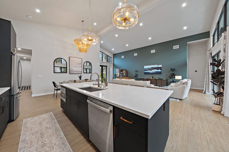 Absolutely stunning modern kitchen and bar that seats 5. The perfect spot for breakfast!