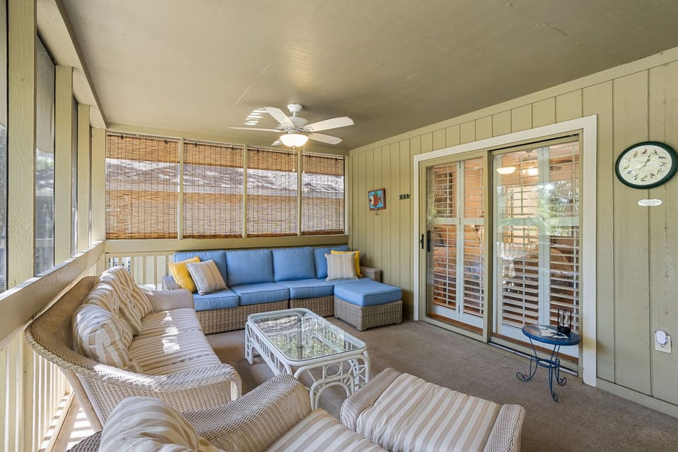 The screened porch offers island breezes in the salty air—pure relaxation.