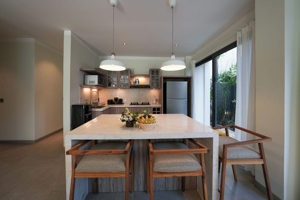 Deluxe Villa, Balcony, Pool View | Private kitchen | Coffee/tea maker
