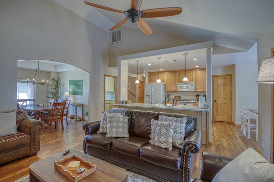 This open concept home sleeps 10 and has a lovely hot tub! Wilderness Cottage is  Pet friendly w/ a fenced backyard.