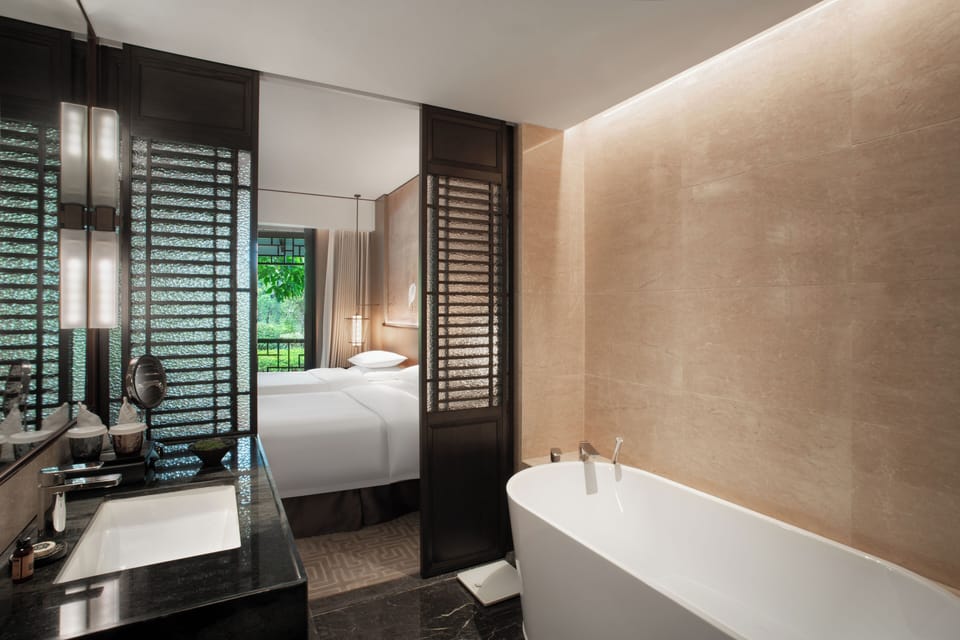 Basic Double Room, Balcony, Park View | Bathroom | Separate tub and shower, hair dryer, slippers, towels