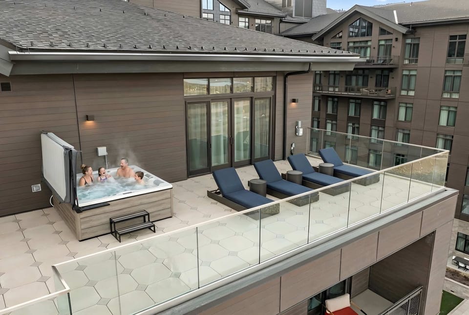 The unit comes with its own private hot tub on the deck overlooking the Jordanelle Reservoir. 