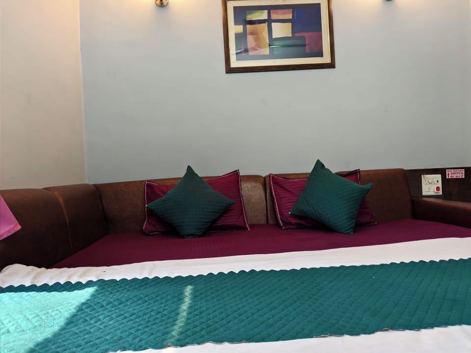 AC Deluxe Triple Bedroom With City View | Premium bedding, down comforters, memory foam beds, desk