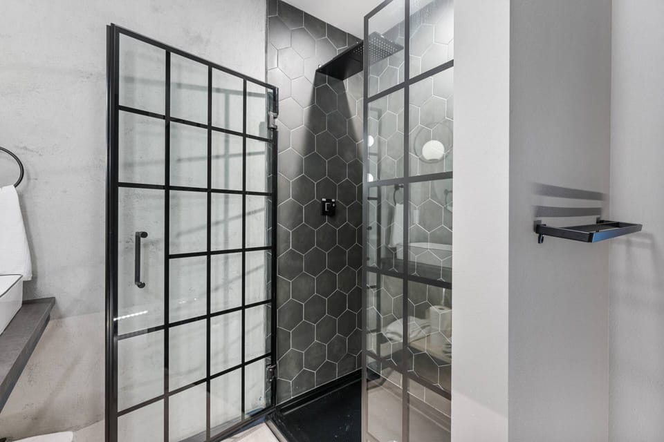 This shower is large, up to date, and has excellent water pressure.