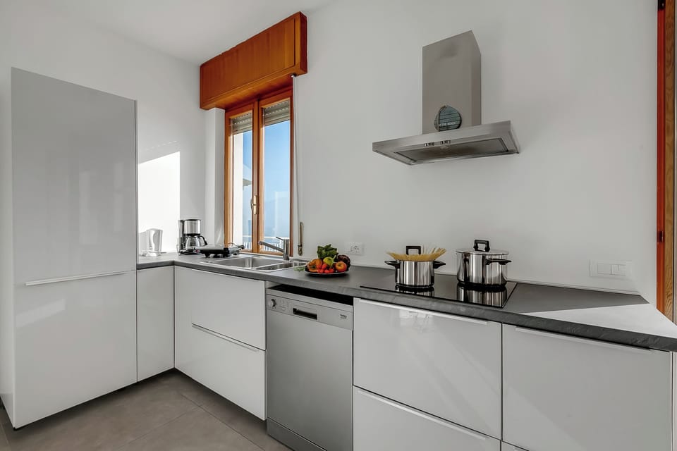 Family Apartment, Multiple Bedrooms (Casa Panorama Tremosine) | Private kitchen | Fridge, microwave, stovetop, dishwasher