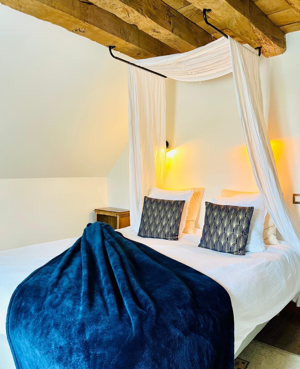 Premium bedding, blackout drapes, iron/ironing board, free WiFi