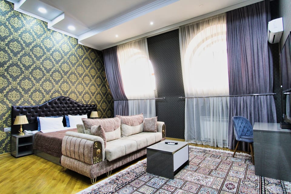 Junior Suite, 1 King Bed, Balcony, City View | Premium bedding, minibar, in-room safe, desk