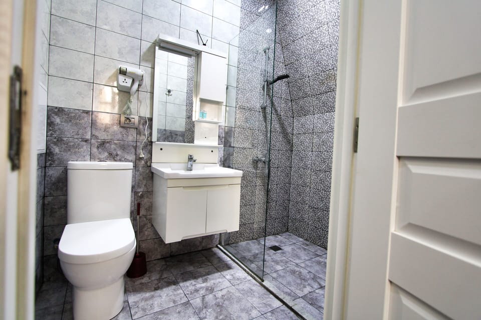 Rainfall showerhead, free toiletries, hair dryer, slippers