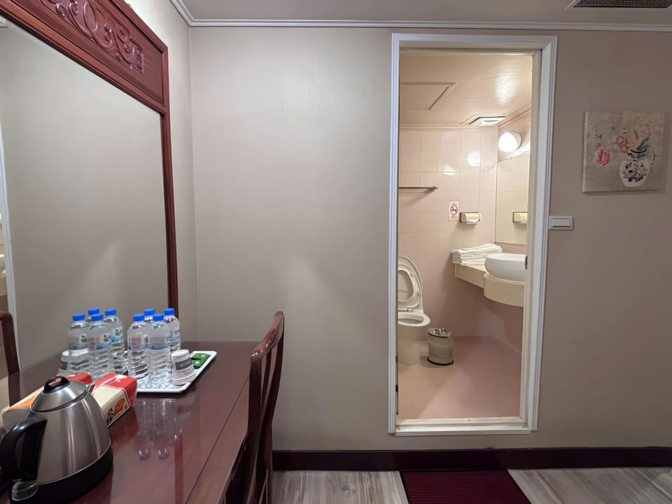 Quadruple Room | Bathroom | Combined shower/tub, free toiletries, hair dryer, towels