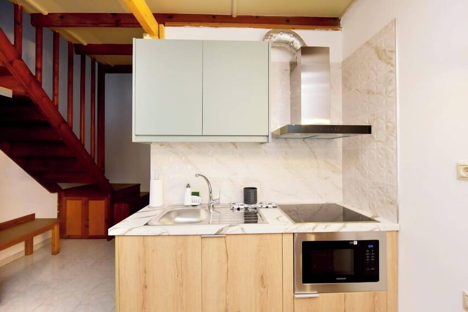 Family Quadruple Room | Private kitchen | Fridge, microwave, stovetop, highchair