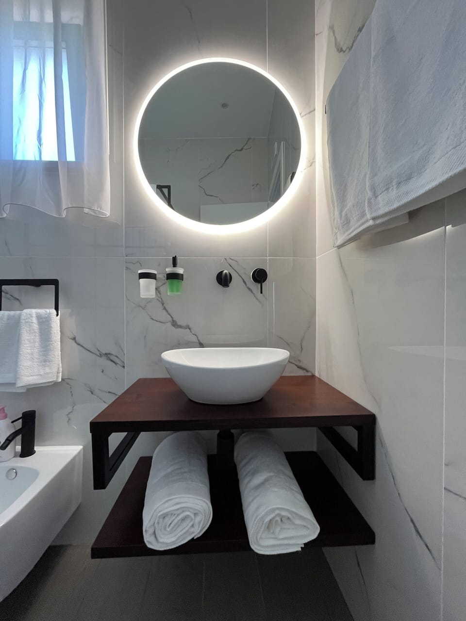 Hair dryer, bidet, towels, soap