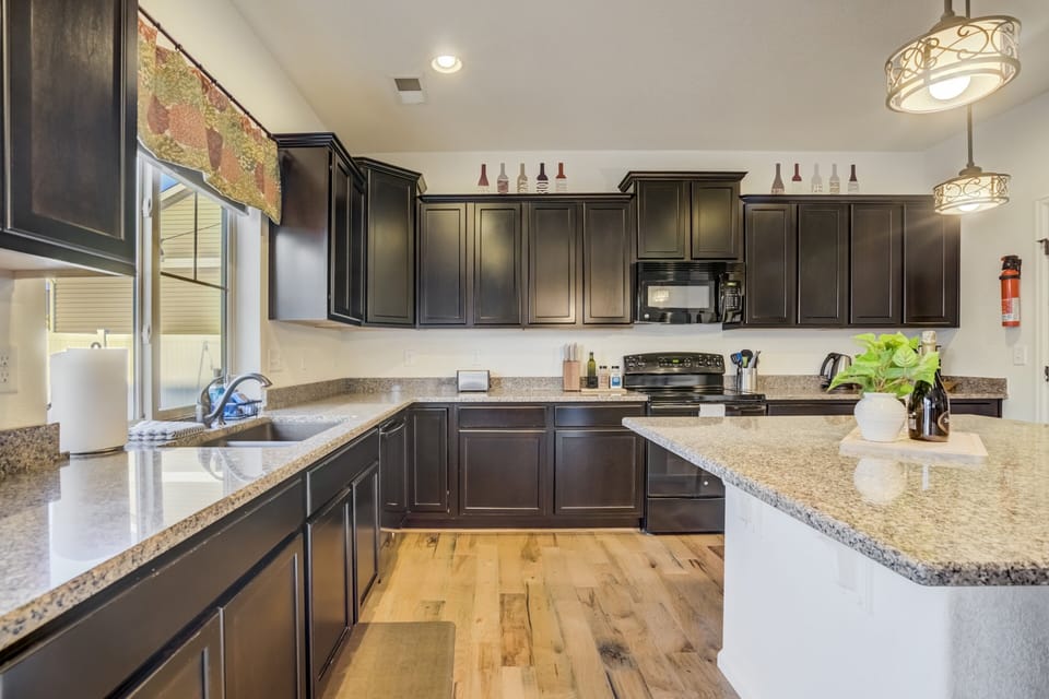 The kitchen is fully equipped with modern appliances and all the essentials