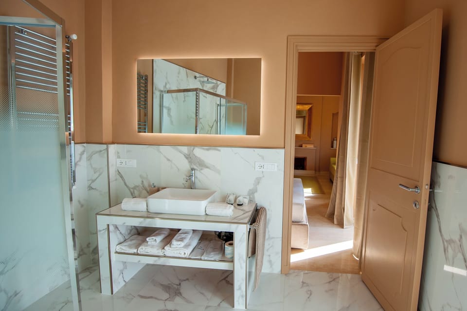 Suite, City View | Bathroom | Slippers, bidet, towels, soap
