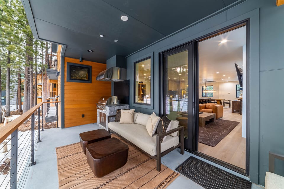 Private deck off the living room with seating area overlooking the gorgeous scenery.