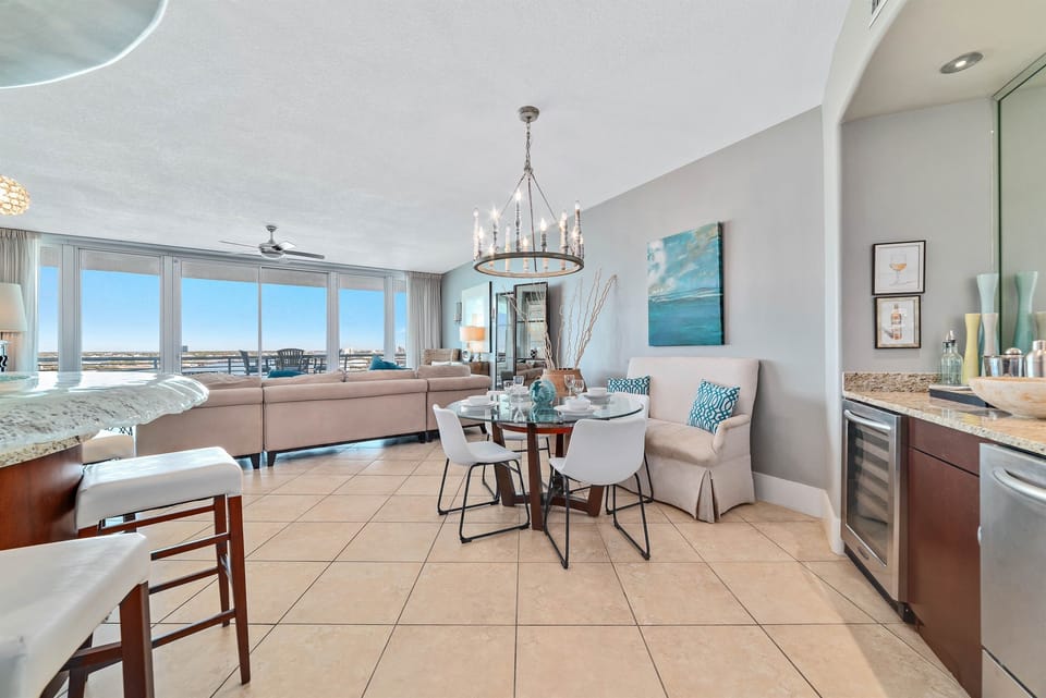 A light-filled living space with captivating views. This inviting room offers a perfect blend of comfort and style, creating a welcoming atmosphere for all.
