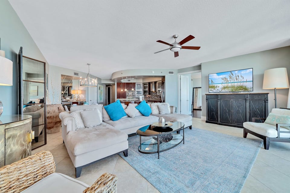 This thoughtfully designed living space maximizes natural light and integrates seamlessly with the surrounding environment. The open-concept layout and expansive windows create a bright and airy atmosphere.