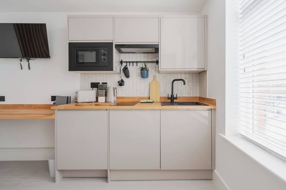 Enjoy the convenience of your own private kitchenette, with access to a fully equipped shared kitchen just steps away for larger meals or extra cooking space.
Includes Private Washing Machine