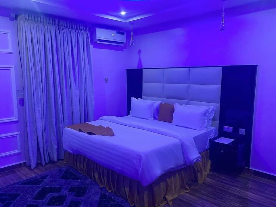 Family Room, Balcony, City View | Desk, laptop workspace, blackout drapes, soundproofing