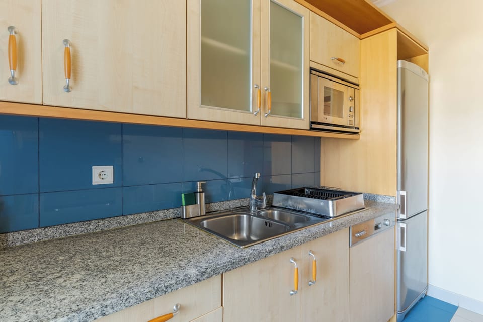 Family Apartment | Private kitchen | Fridge, microwave, oven, stovetop