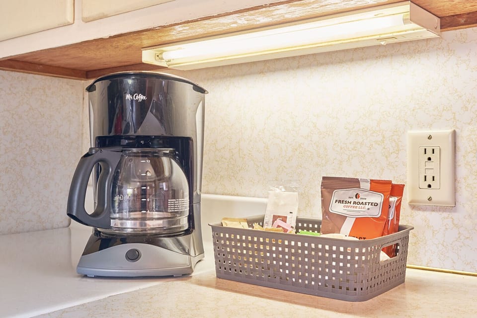 Enjoy fresh mornings with a coffee maker and complimentary coffee ready to brew. ☕🌅