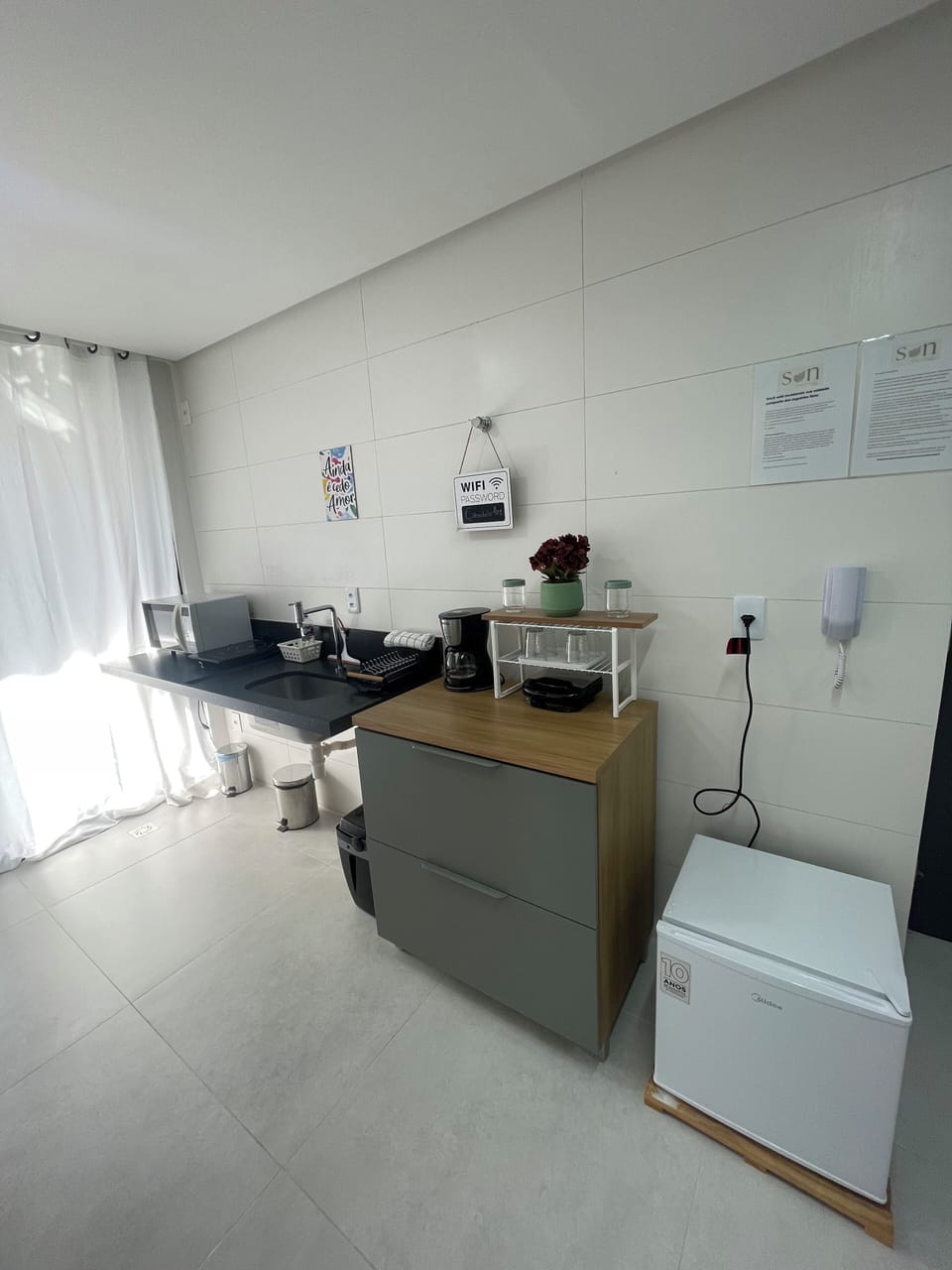 Apartment | Private kitchen | Mini-fridge, microwave, stovetop, cookware/dishes/utensils