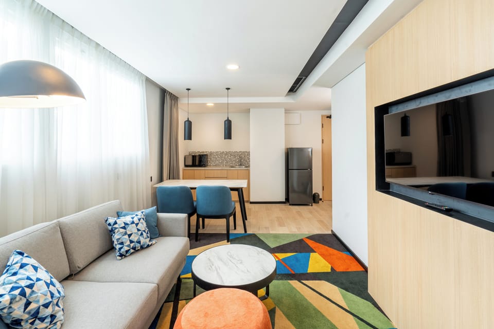 Suite, 1 Bedroom | Living area | 42-inch Smart TV with digital channels, Netflix, streaming services