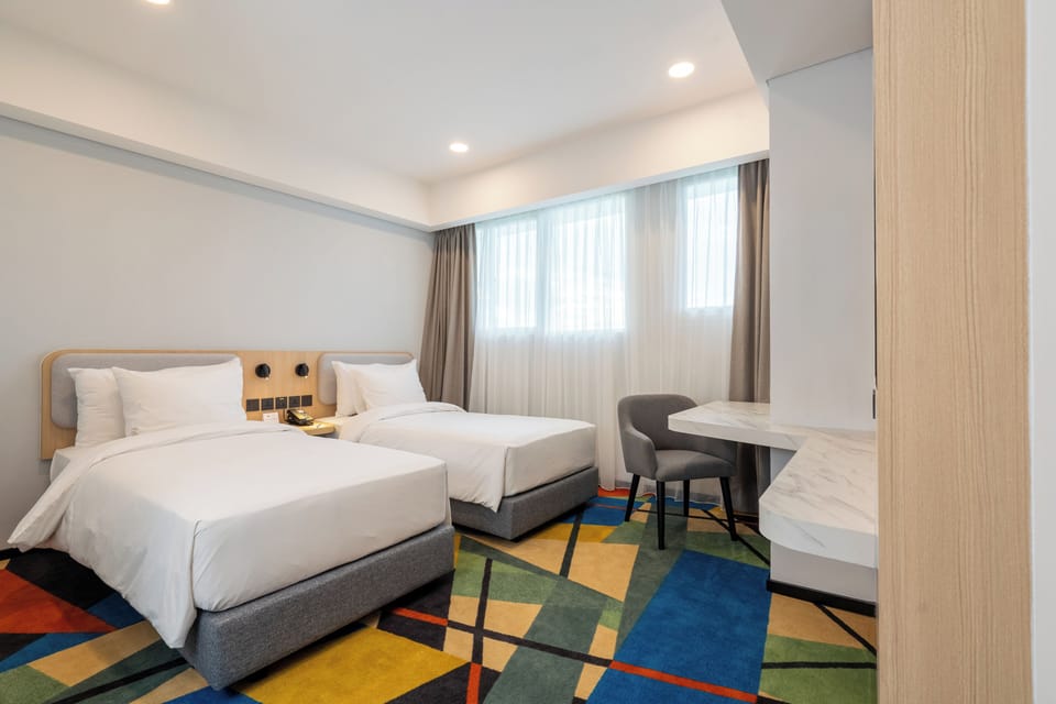 Standard Room, 2 Twin Beds | Minibar, in-room safe, desk, laptop workspace