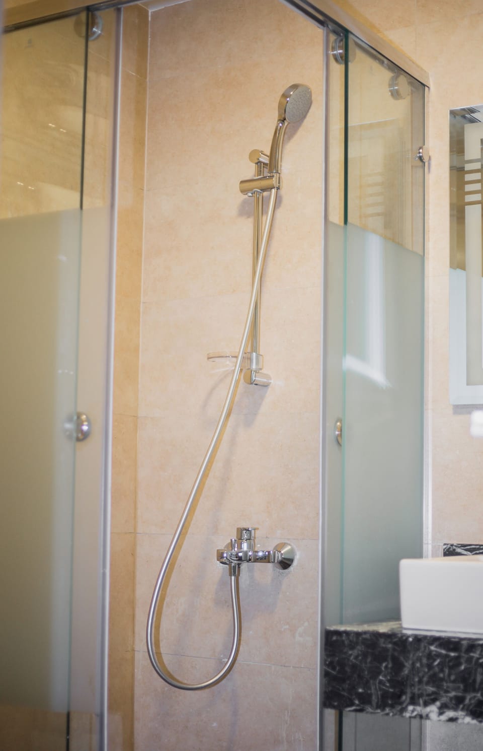 Shower, free toiletries, hair dryer, slippers
