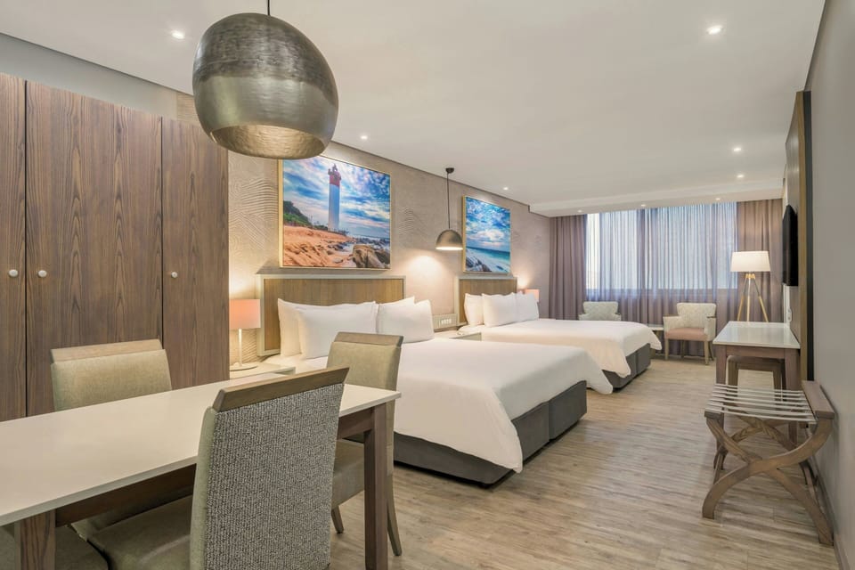 Room, 1 King Bed, Partial Ocean View | 1 bedroom, in-room safe, desk, laptop workspace