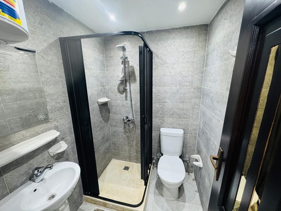 Luxury Apartment | Bathroom | Shower, rainfall showerhead, designer toiletries, bidet