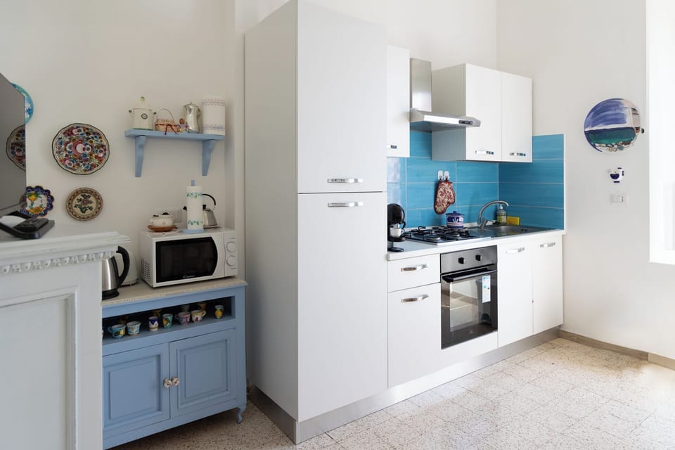 Comfort Apartment, City View | Private kitchen | Electric kettle