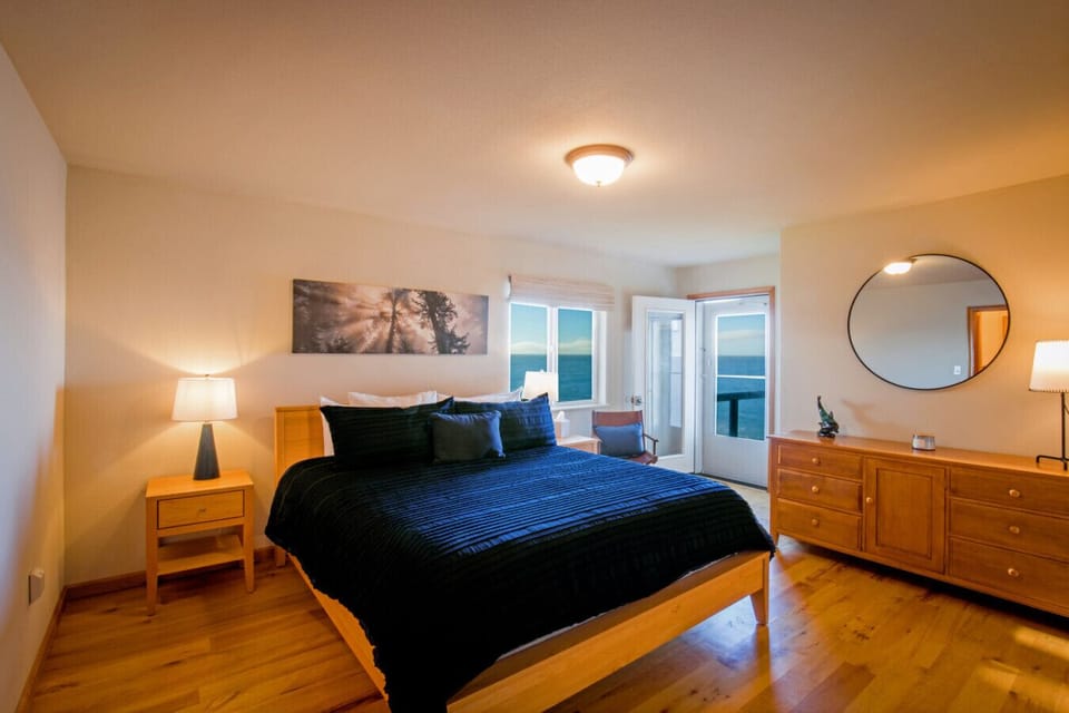 The master bedroom that sits off of the upstairs living room with deck access.