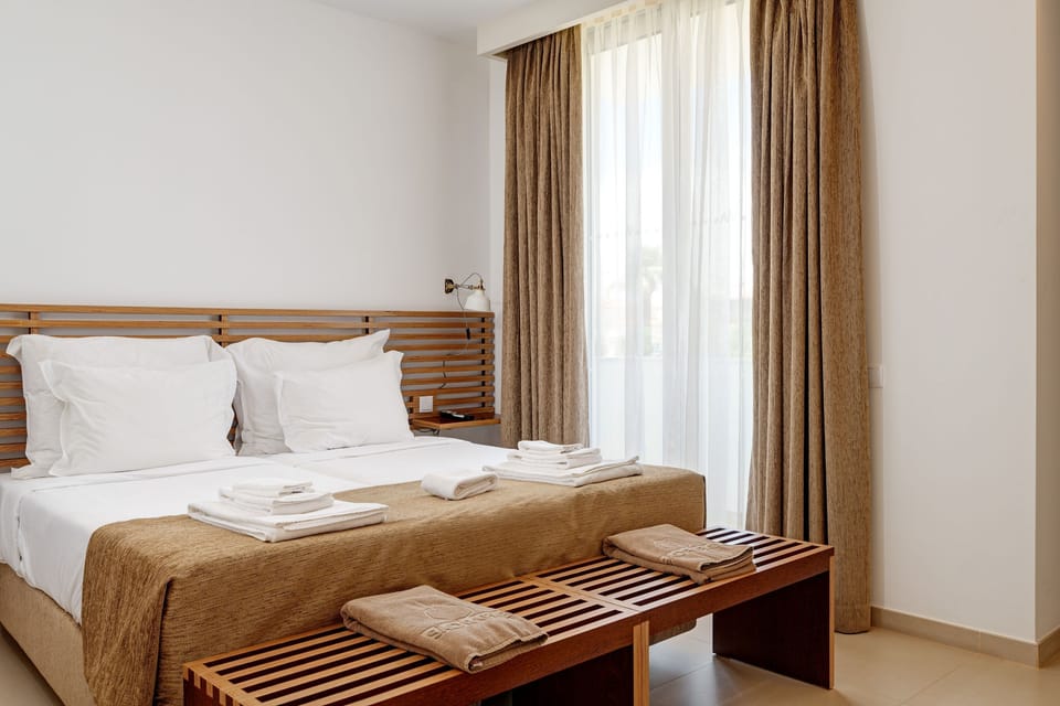 Bedroom featuring a patio door entrance