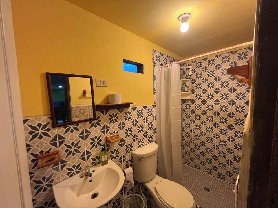 Basic Shared Dormitory | Bathroom | Shower, free toiletries, towels, soap